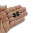 Black crystal dangle earrings, Gold wrapped crystal earrings, Faceted oval drop earrings, Nickel free jewelry